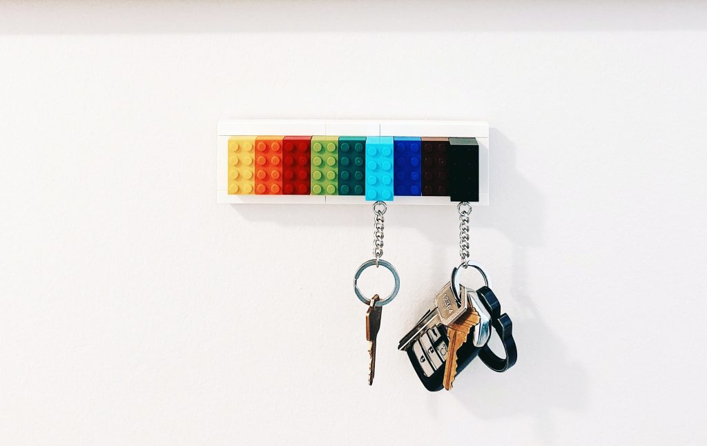 keys hanging on a lego key holder