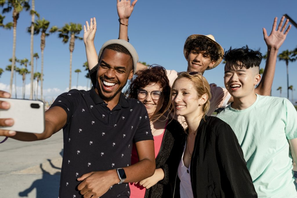 Group shot of best friends, summer in Venice Beach, Los Angeles