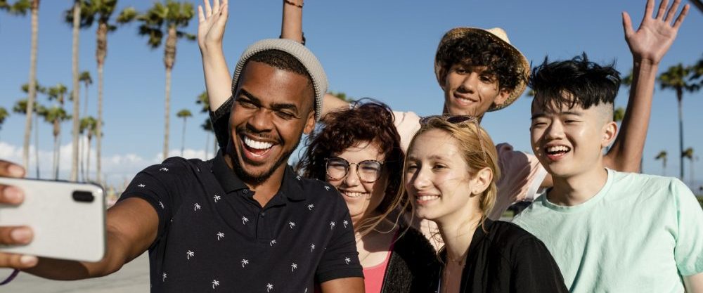 Group shot of best friends, summer in Venice Beach, Los Angeles