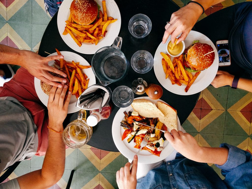 aerial shot of people eating a meal together