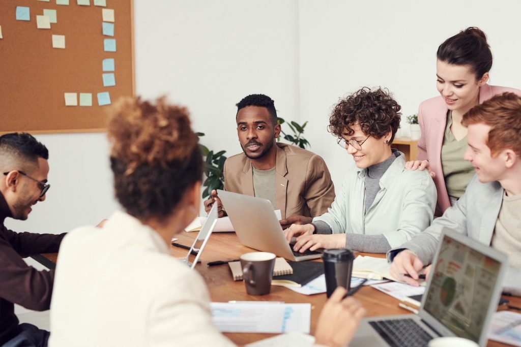 people having a rebranding meeting