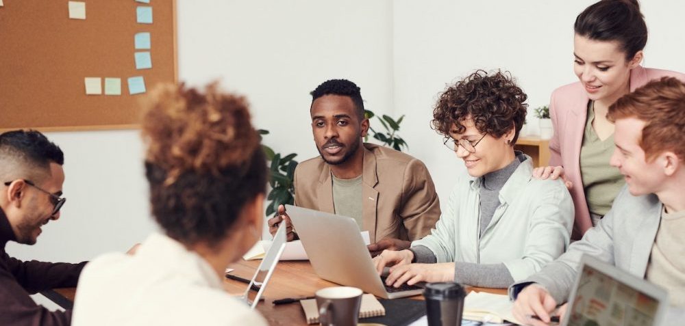 people having a rebranding meeting