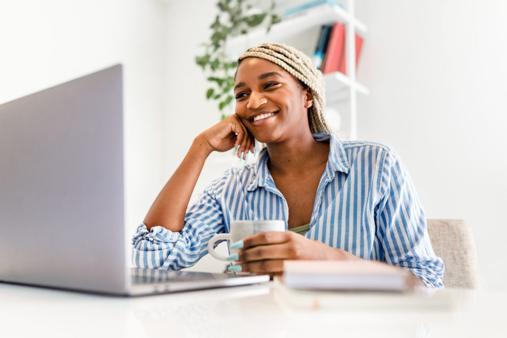 woman working on laptop computer