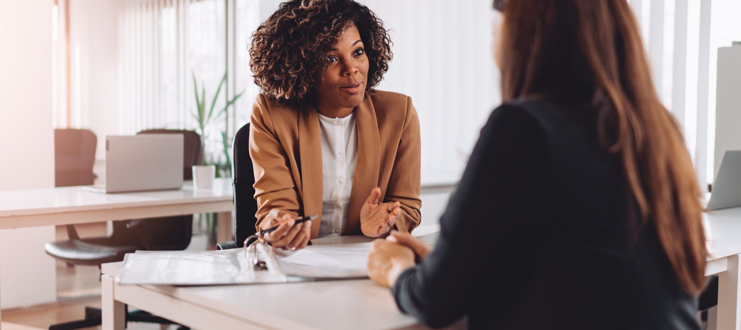 Young woman from a business doing an interview with a marketing professional